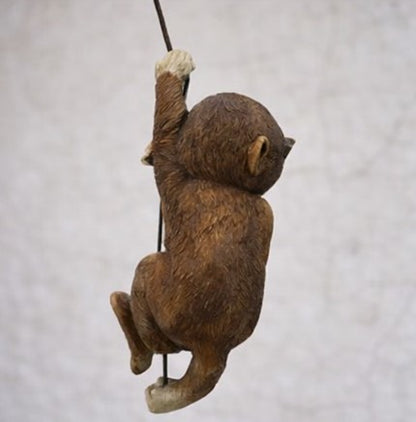 Playful Hanging Monkey Statue