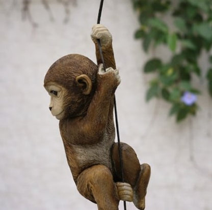 Playful Hanging Monkey Statue